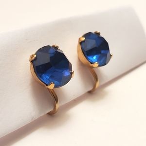 Vintage 50s Coro gold tone screw post earrings with sapphire blue color stone